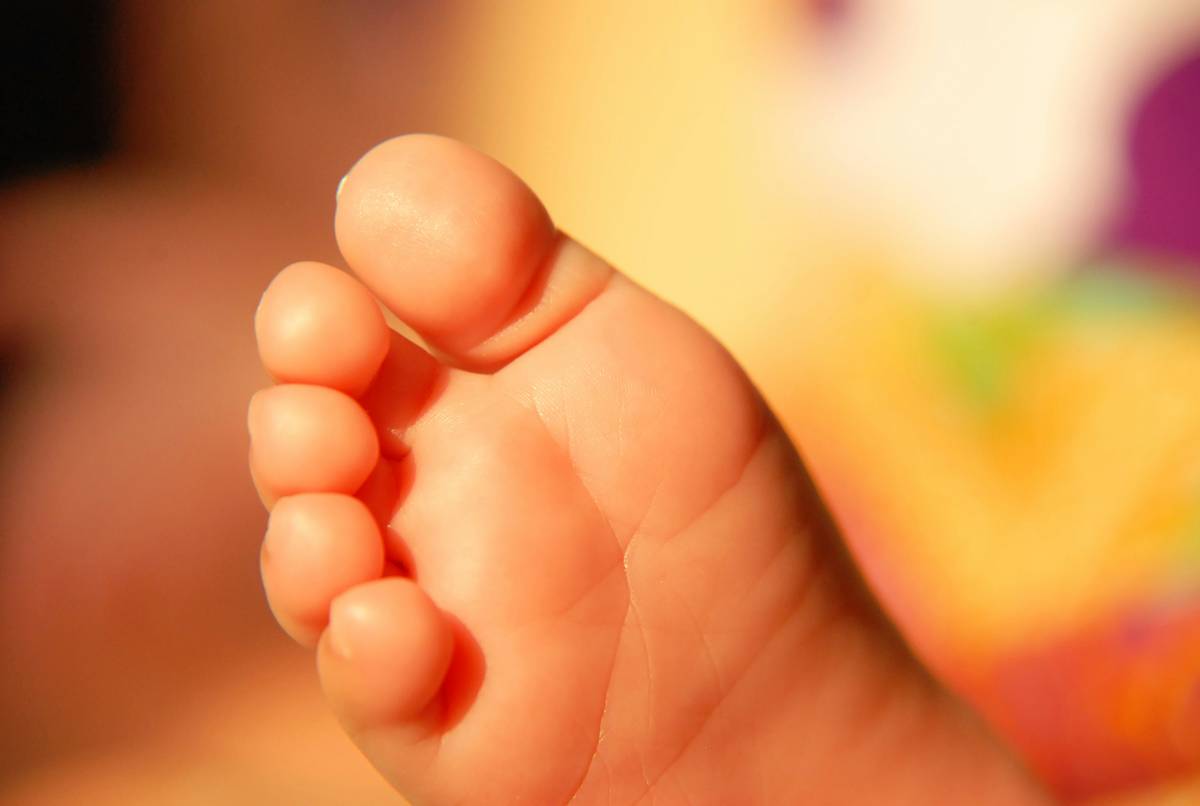 Close-up of smooth feet after regular use of baby foot deep moisturizing foot cream